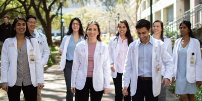 Thumbnail of students posing