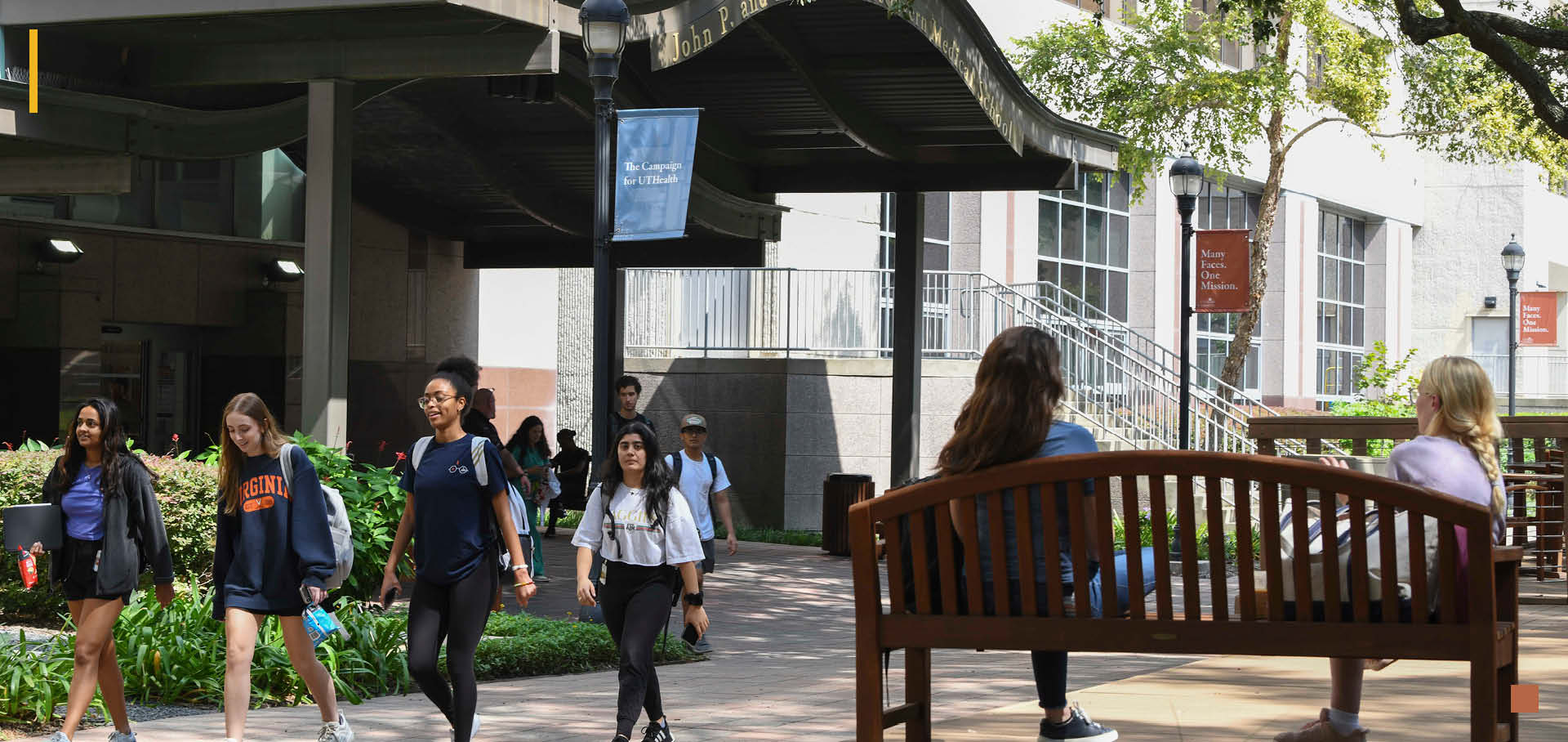 Photo of students walking in Weber Plaza