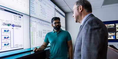 Medical employees reviewing data