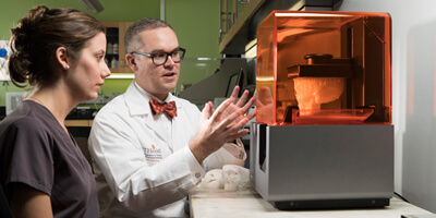 Medical professionals observing an experiment